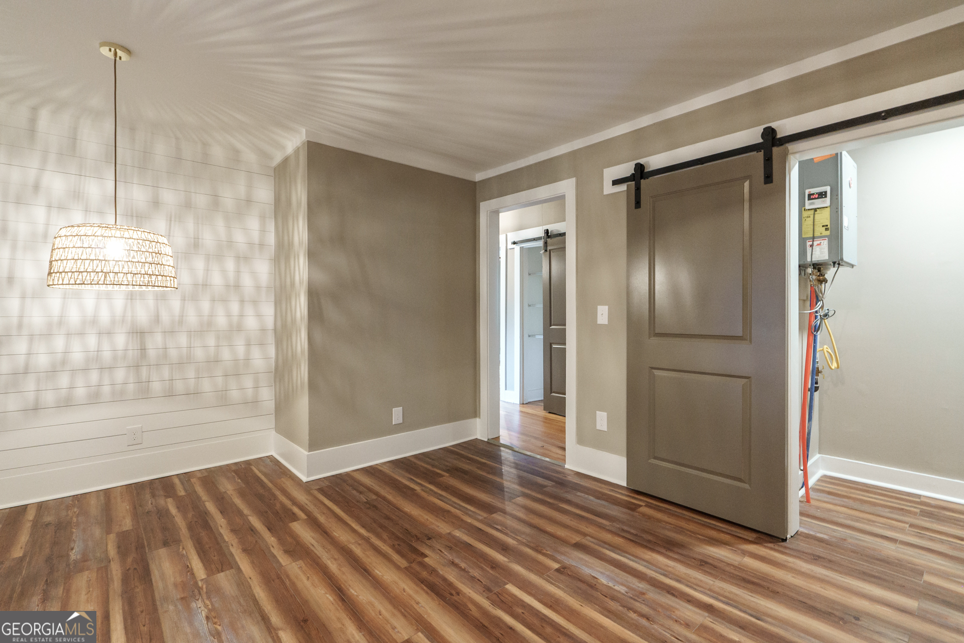 175 East Main Street, Unit B Rutledge, GA 30663 - Photo 18 of 28 a view of wooden floor and windows in a room
