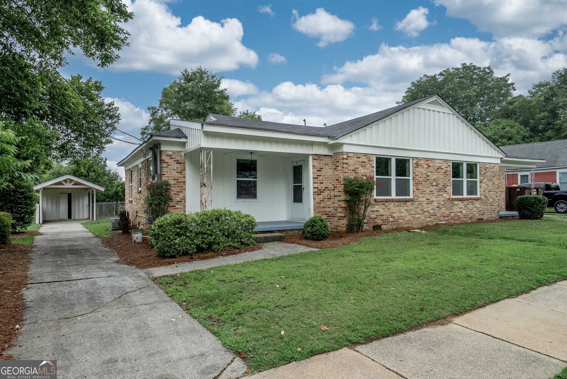 175 East Main Street, Unit B Rutledge, GA 30663 - Photo 3 of 28 a front view of a house with a garden