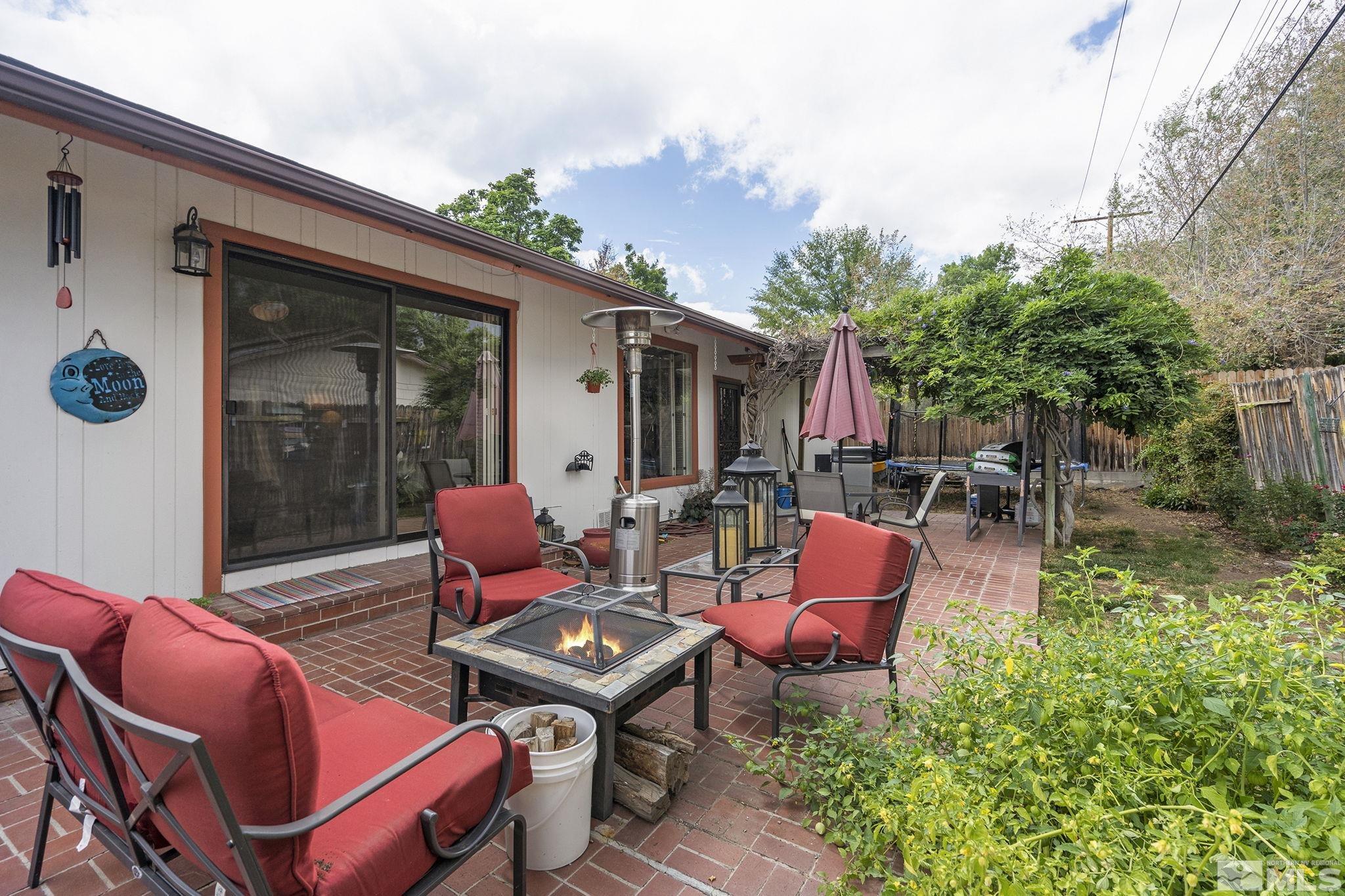 1985 Windsor Way Reno, NV 89503 - Photo 13 of 16 a backyard of a house with outdoor seating