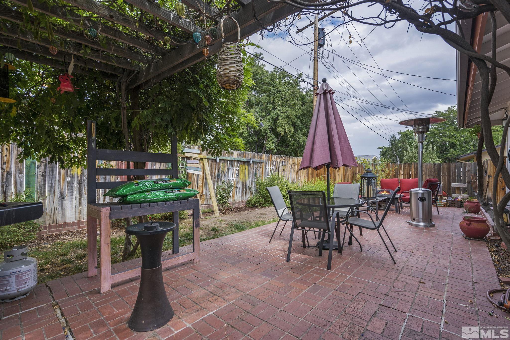 1985 Windsor Way Reno, NV 89503 - Photo 14 of 16 a view of a tables and chairs in a patio