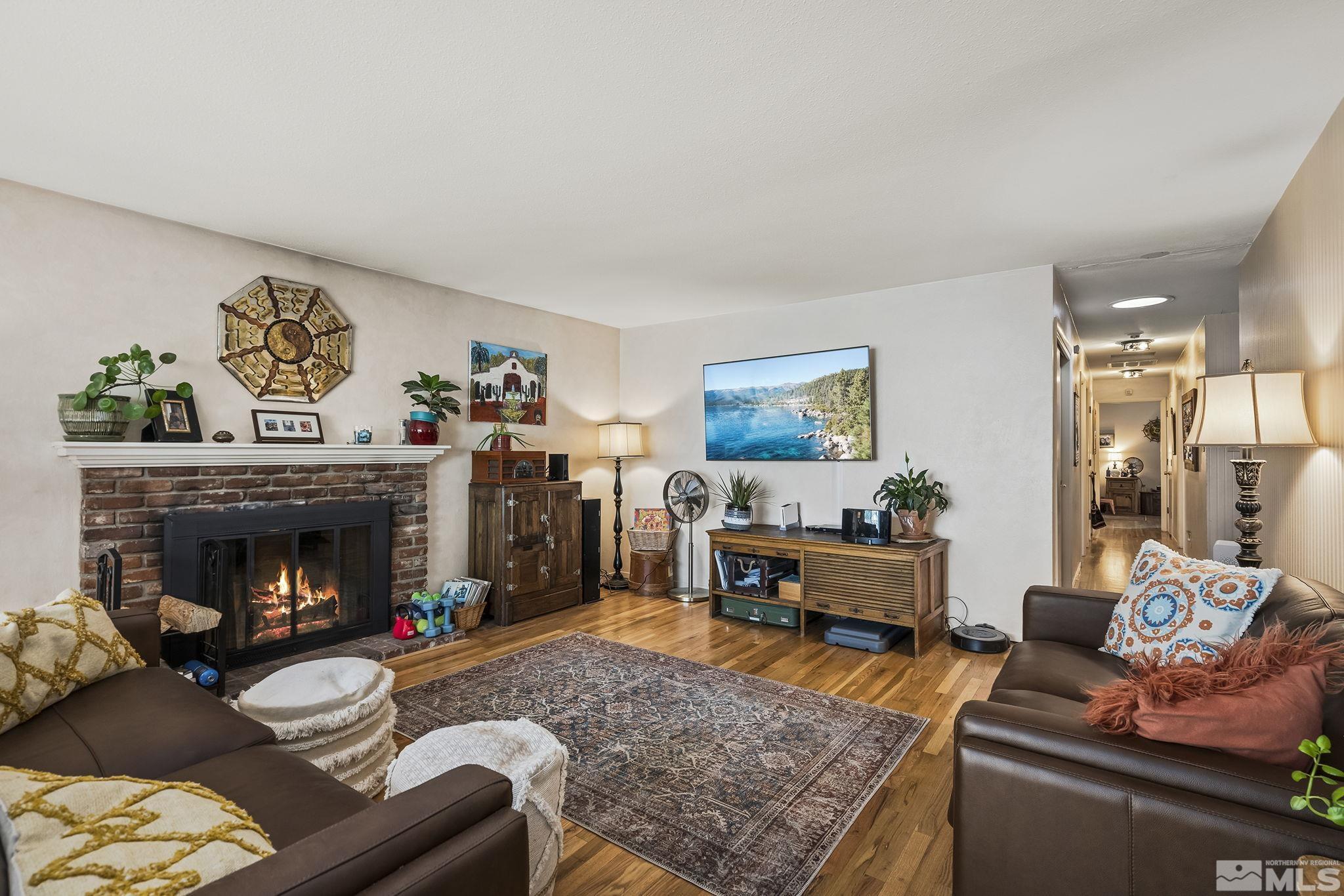 1985 Windsor Way Reno, NV 89503 - Photo 2 of 16 a living room with furniture and a fireplace
