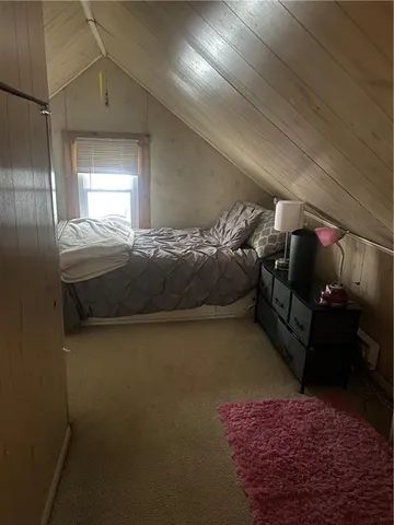 a room with furniture and a window