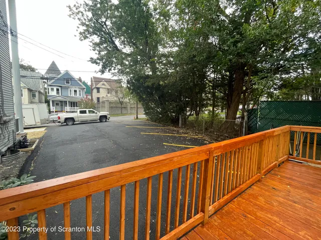 a bathroom with a sink a mirror and a toilet