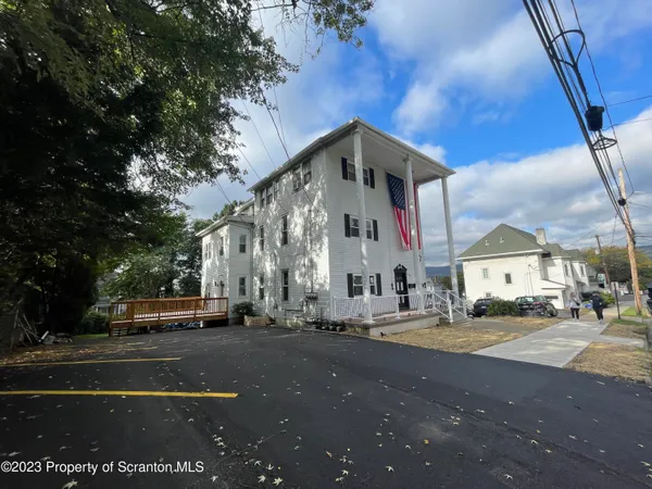 a house with yard in front of it