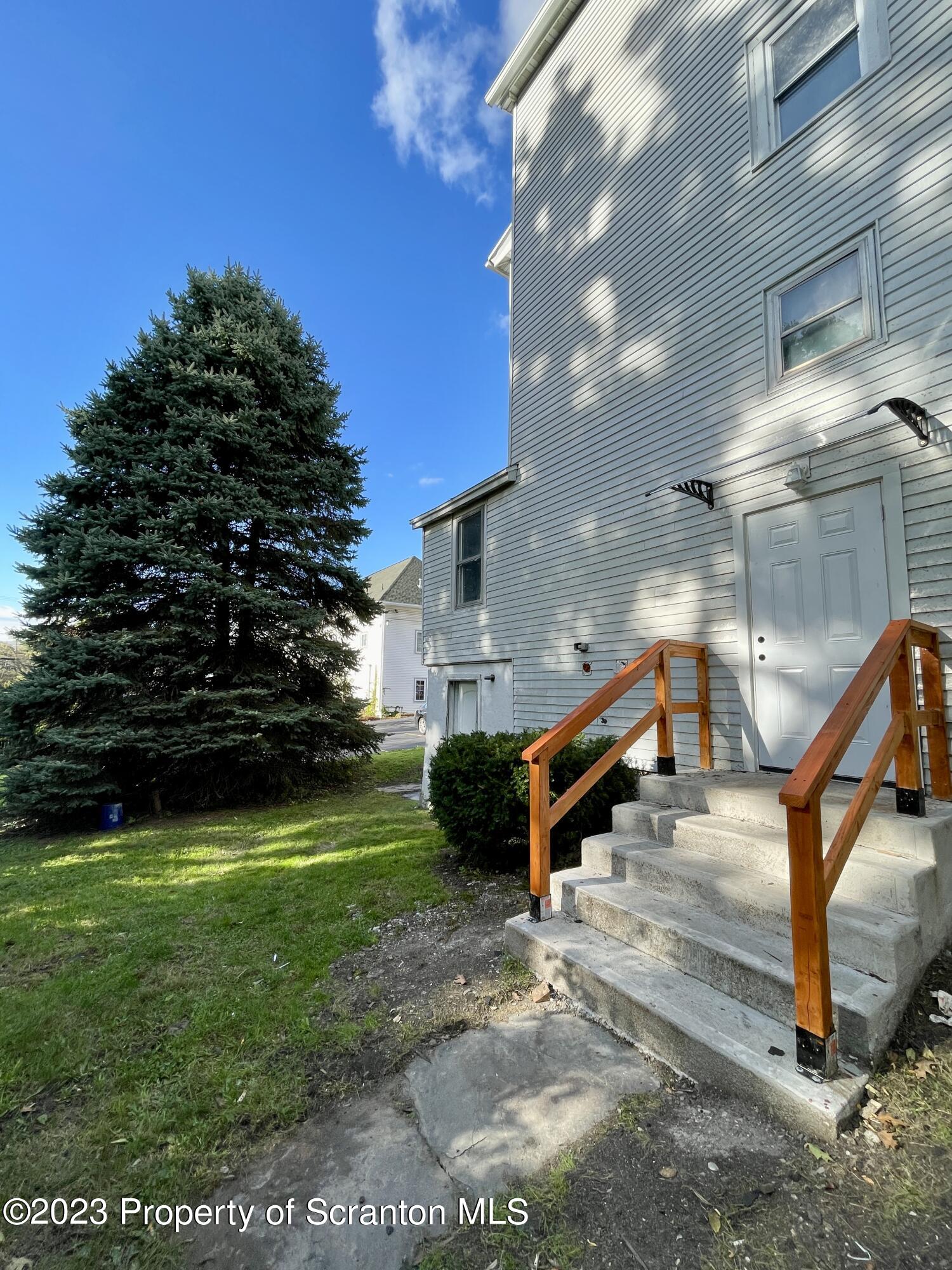 1216 Marion Street Scranton, PA 18509 - Photo 37 of 37 a view of a bench in a yard
