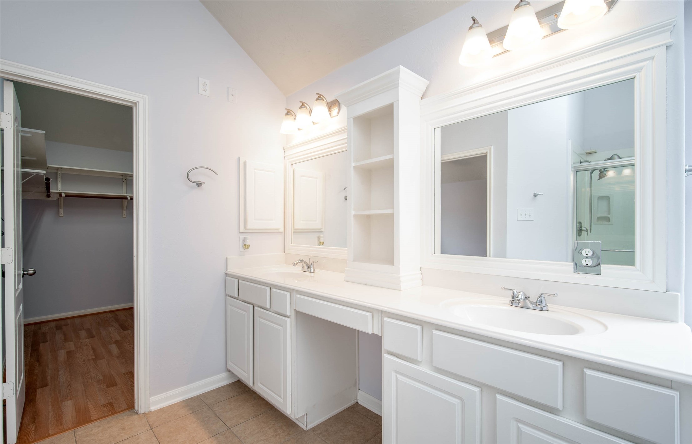 9323 Hillhaven Court Rosenberg, TX 77469 - Photo 24 of 37 a bathroom with a sink double vanity and a mirror