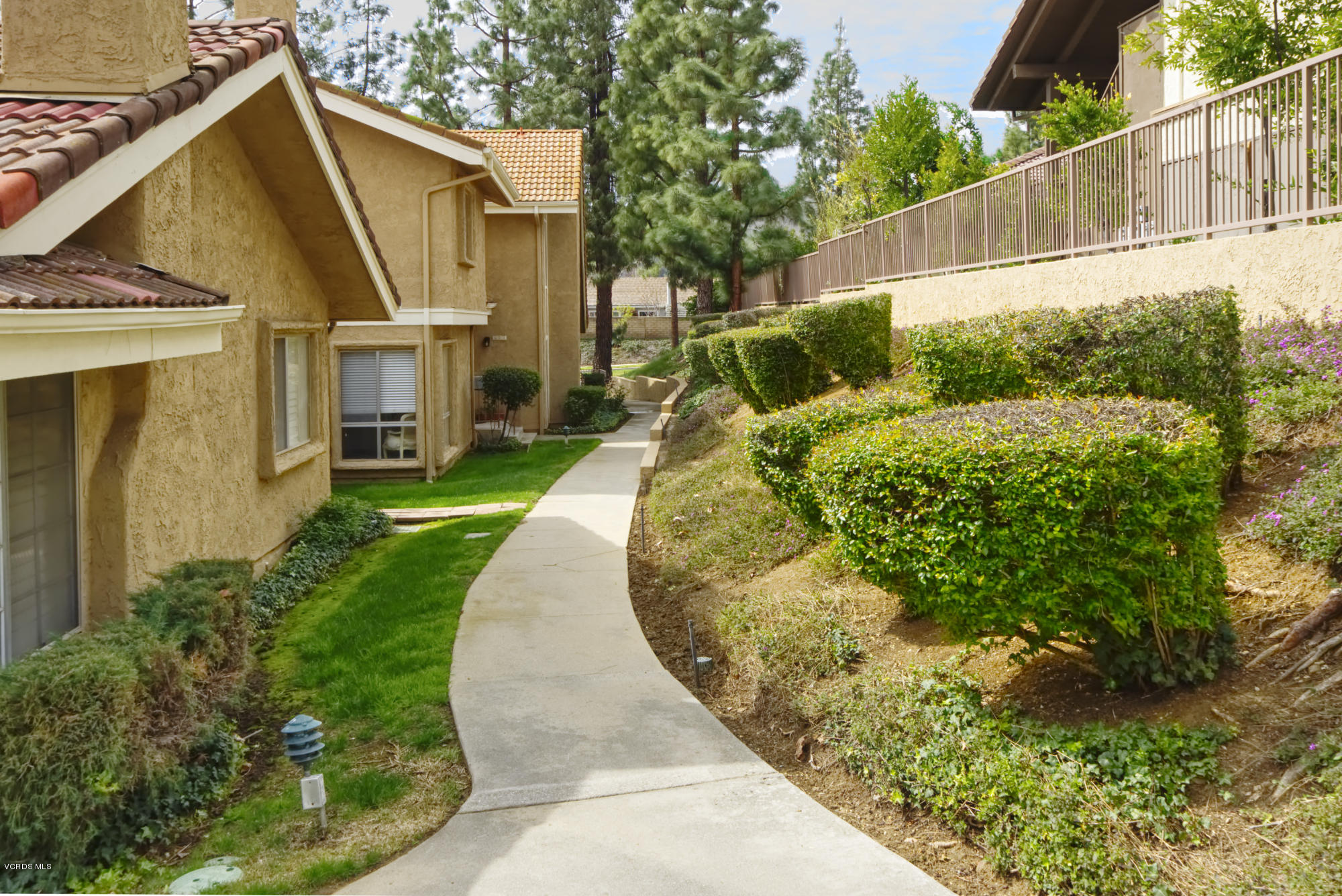 326 Kanan Road Oak Park, CA 91377 - Photo 31 of 35 pathway to front door