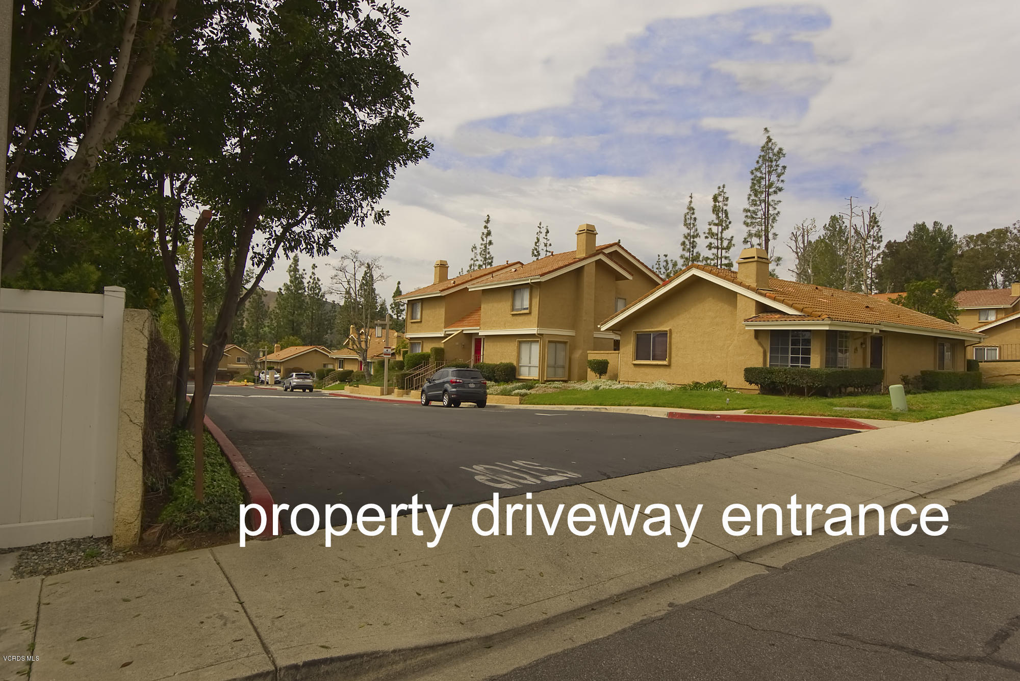 326 Kanan Road Oak Park, CA 91377 - Photo 34 of 35 driveway entrance