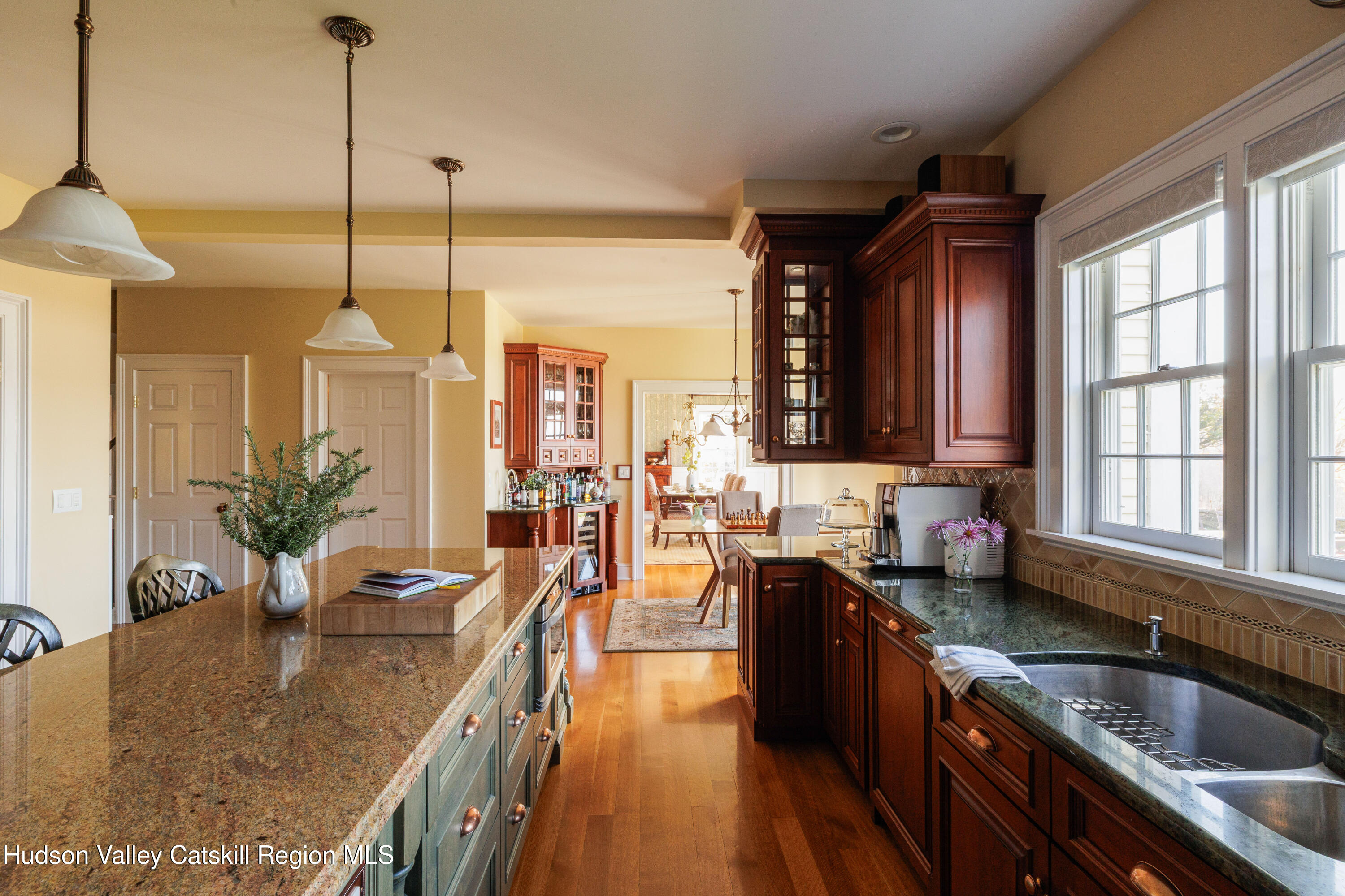 189 Sutherland Road Valatie, NY 12184 - Photo 19 of 94 a kitchen with sink refrigerator and cabinets