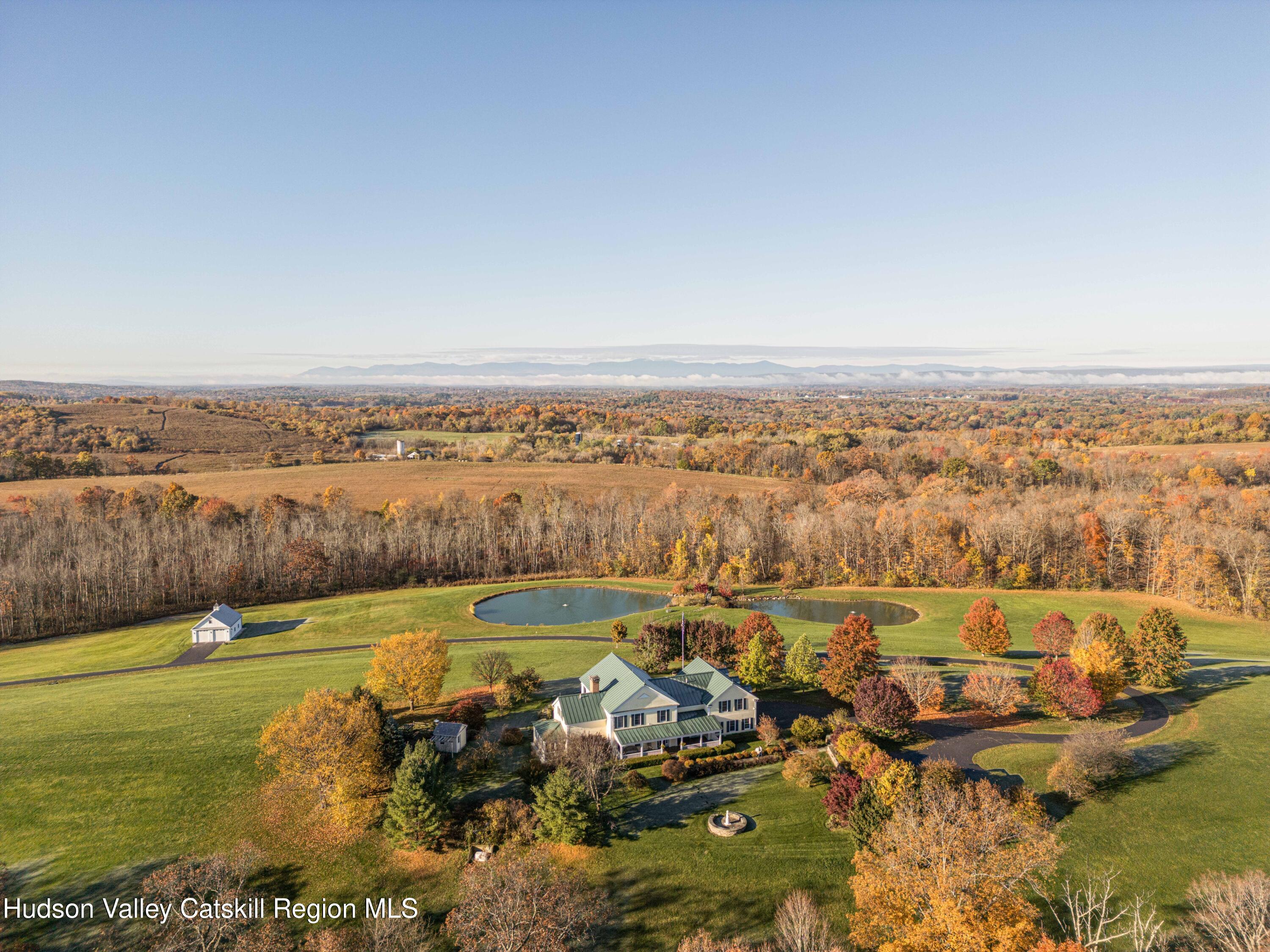 189 Sutherland Road Valatie, NY 12184 - Photo 2 of 94 a view of a lake with a city