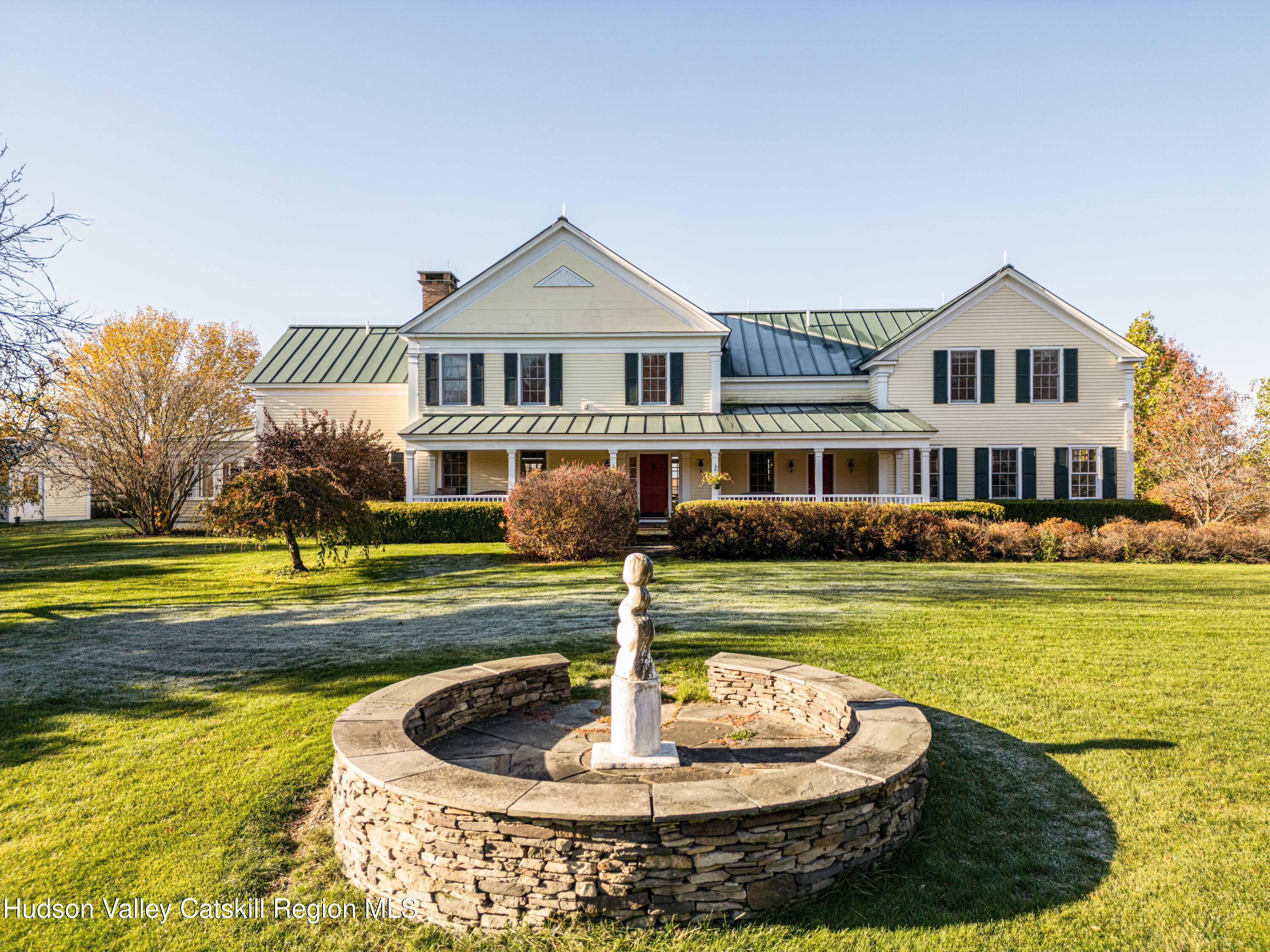 189 Sutherland Road Valatie, NY 12184 - Photo 6 of 94 a front view of a house with a swimming pool