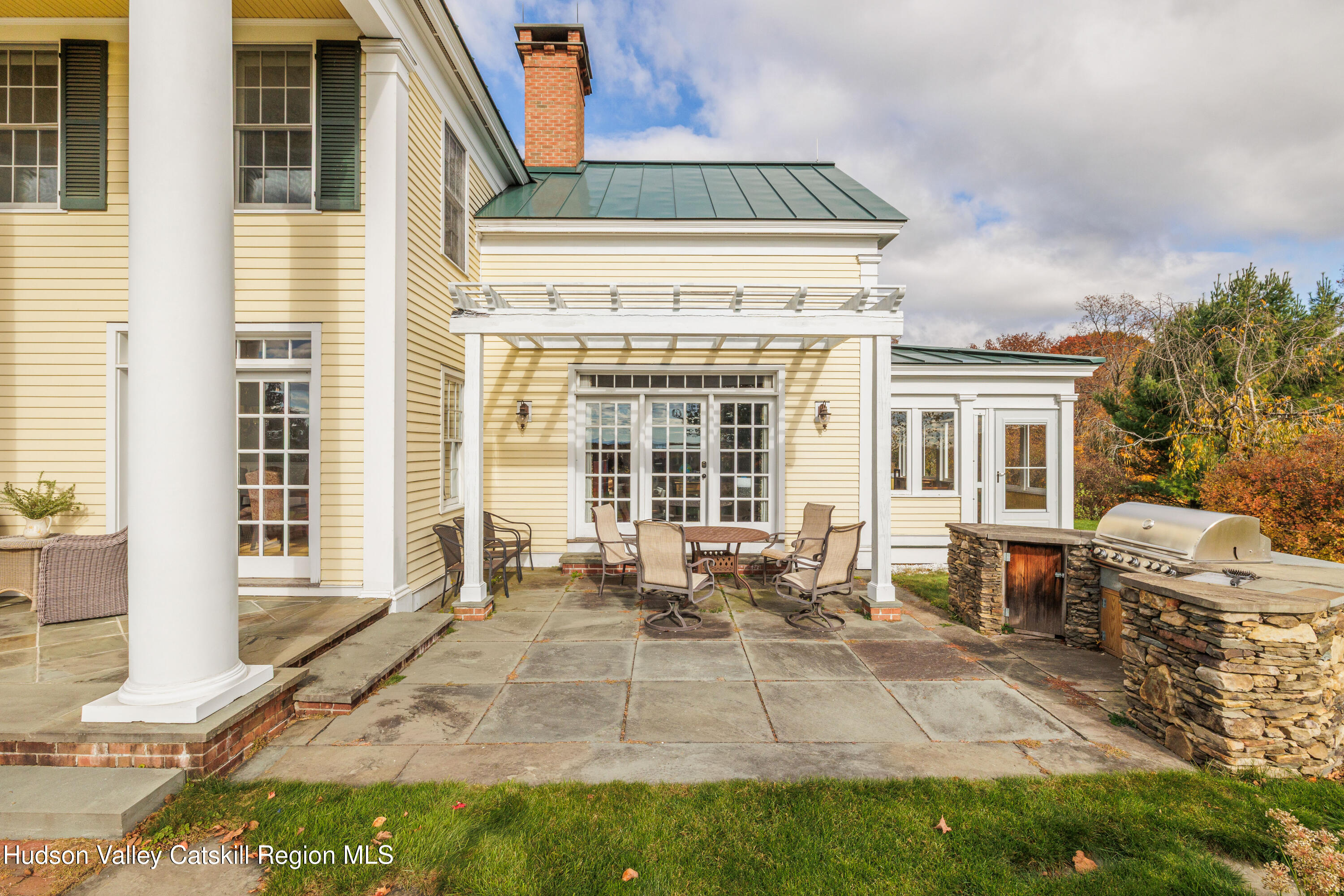 189 Sutherland Road Valatie, NY 12184 - Photo 67 of 94 a view of a house with backyard sitting area and garden