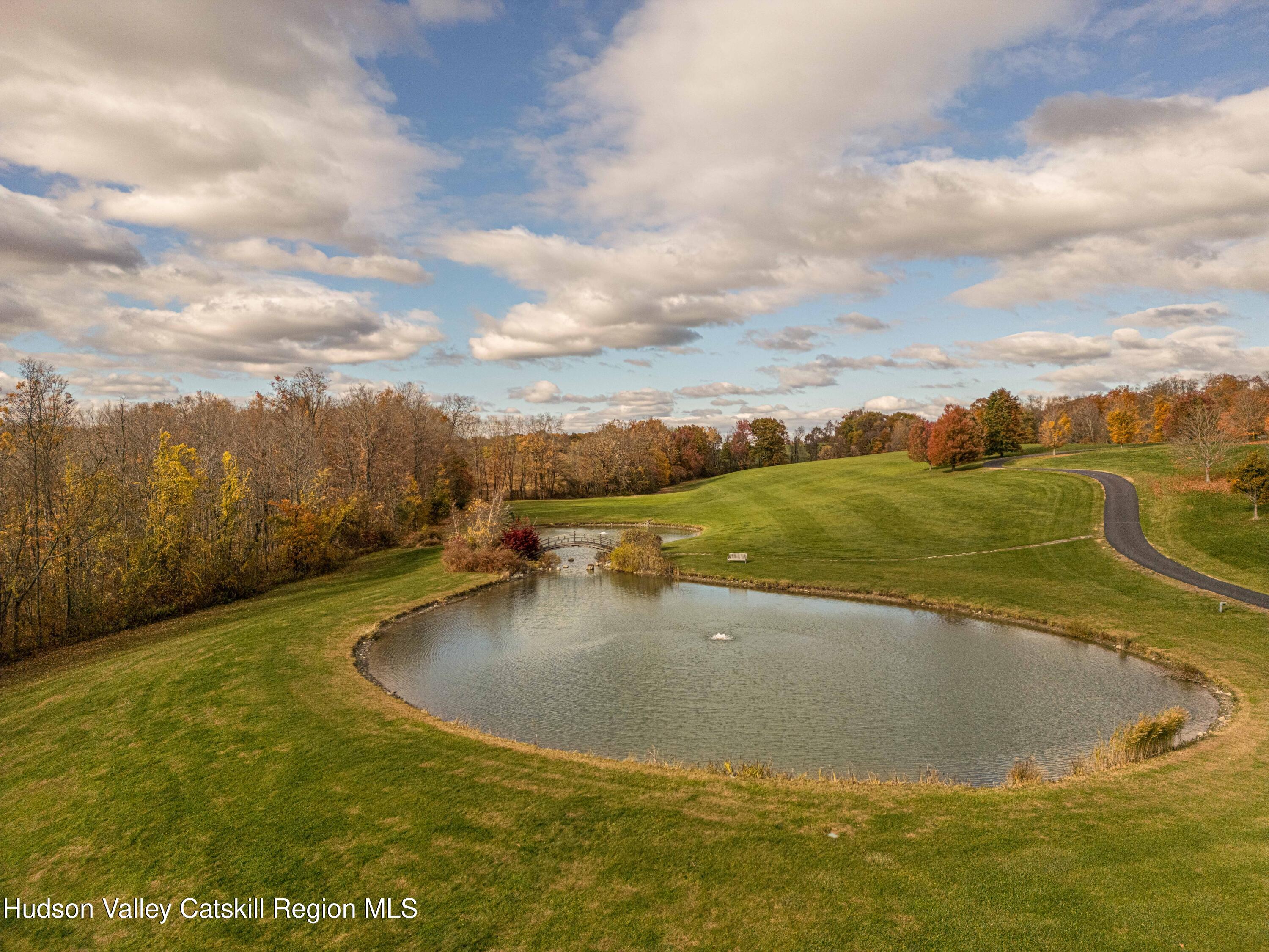 189 Sutherland Road Valatie, NY 12184 - Photo 82 of 94 a view of a swimming pool with an ocean view