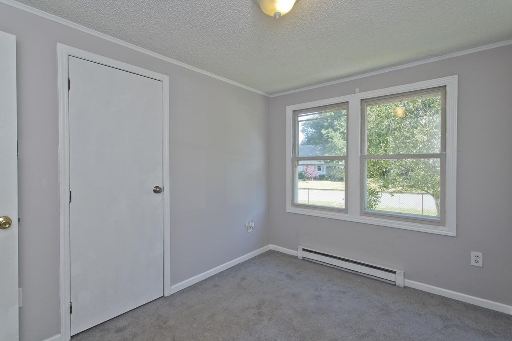 25 Driftwood Road Springfield, MA 01128 - Photo 13 of 21 a view of an empty room with a window