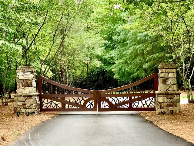 a view of a street with benches in the background