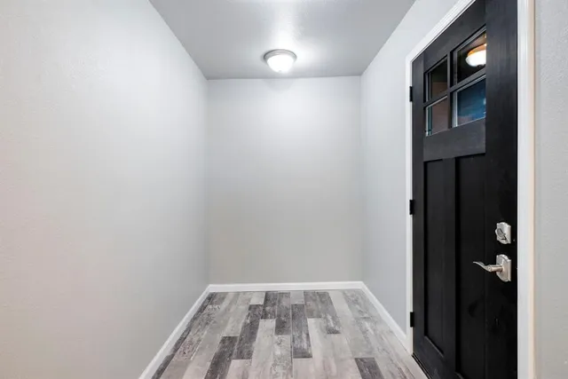 a view of small space with wooden floor