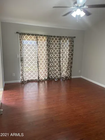 a bathroom with a sink vanity and mirror