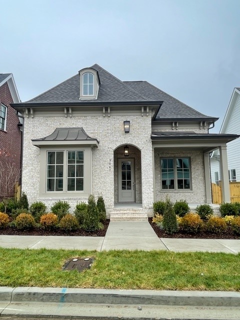 3067 Conar Street Franklin, TN 37064 - Photo 1 of 4 a front view of a house with garden