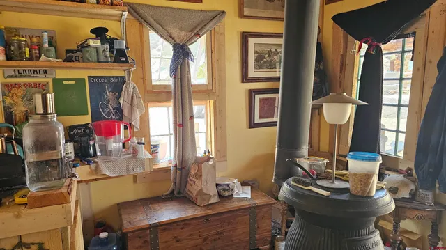 a room with furniture and wooden floor