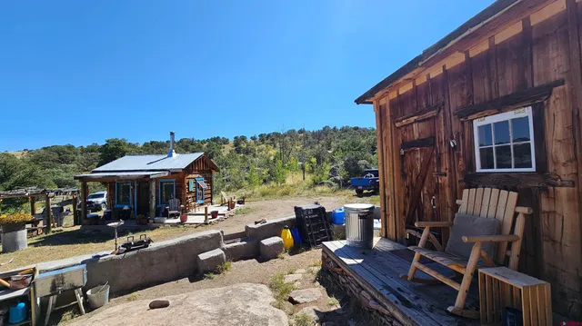 a bathroom with a sink a mirror a bathtub and shower
