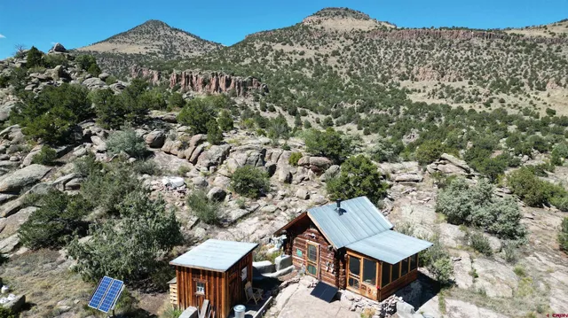 an aerial view of a houses with a outdoor space