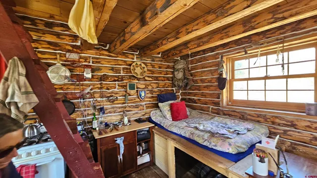 a stove top oven sitting inside of a kitchen