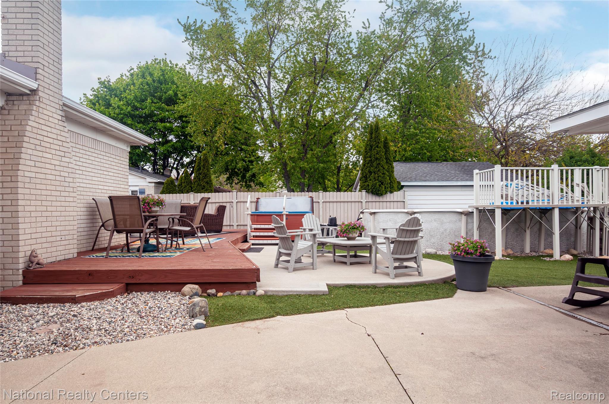2446 Milverton Road Troy, MI 48083 - Photo 37 of 41 Fenced backyard featuring a wooden deck and a patio