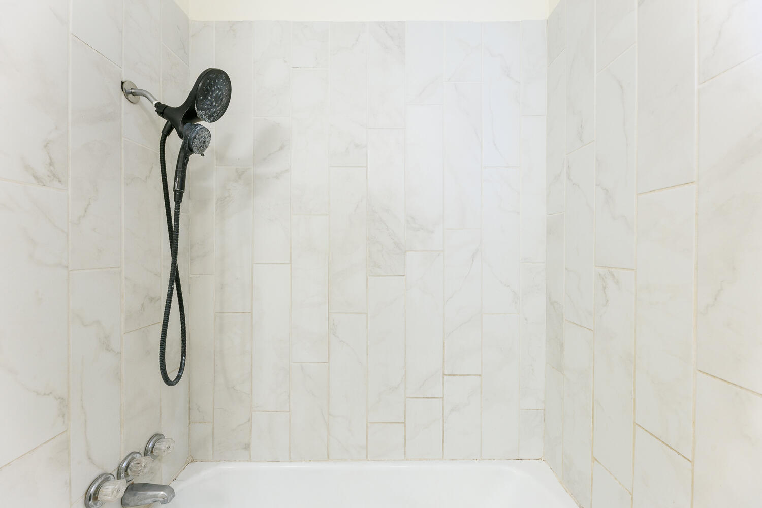 4319 40th Street Lubbock, TX 79413 - Photo 24 of 38 a bathroom with a shower