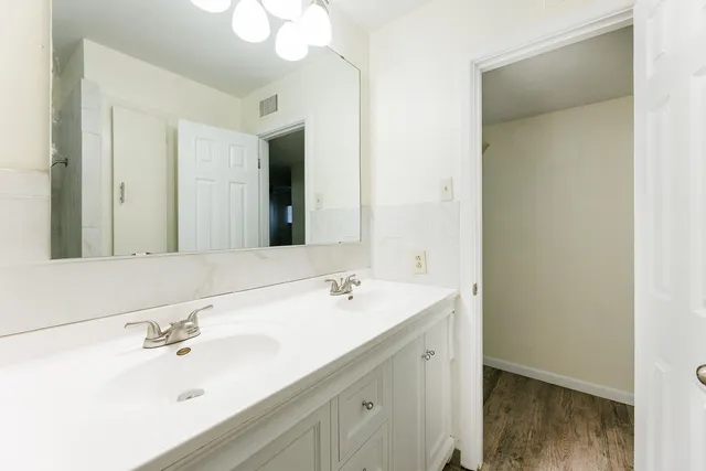 a view of a house with a snow in the yard