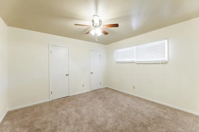 a view of a backyard of the house