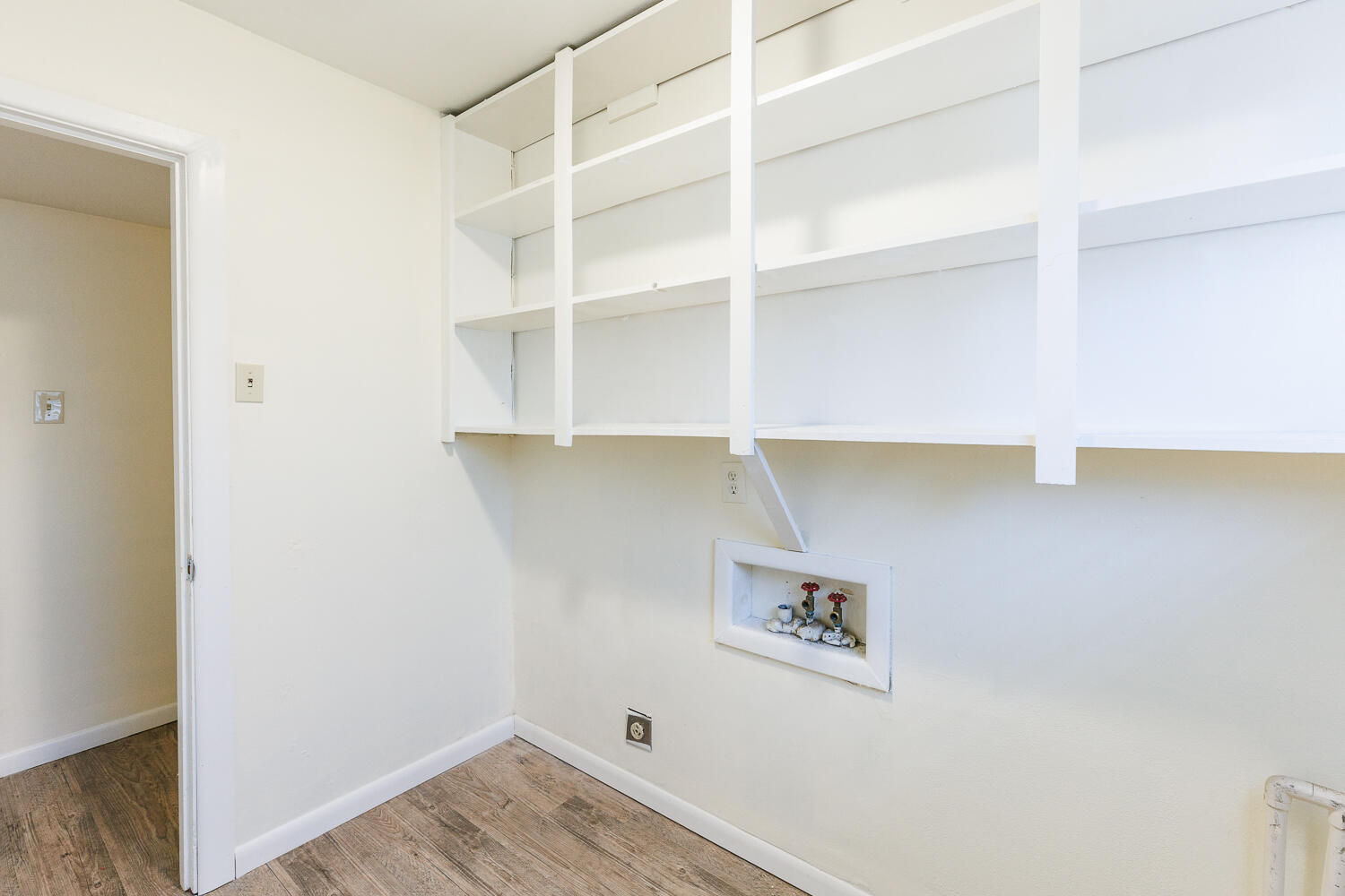 4319 40th Street Lubbock, TX 79413 - Photo 32 of 38 a view of a hallway with shelf