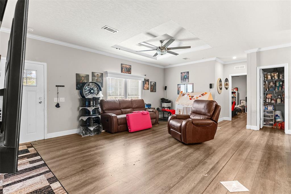 8010 Palmer Road Bartow, FL 33830 - Photo 7 of 22 a bedroom with furniture and wooden floor