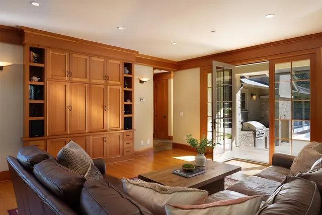 a view of a house with backyard and porch