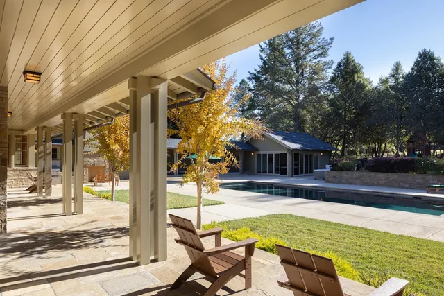 a view of backyard with cabin