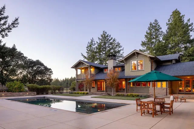 a view of the patio with swimming pool