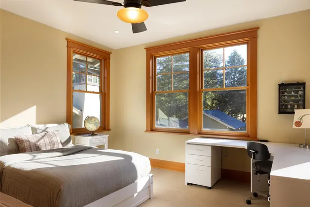 a bedroom with a bed and furniture