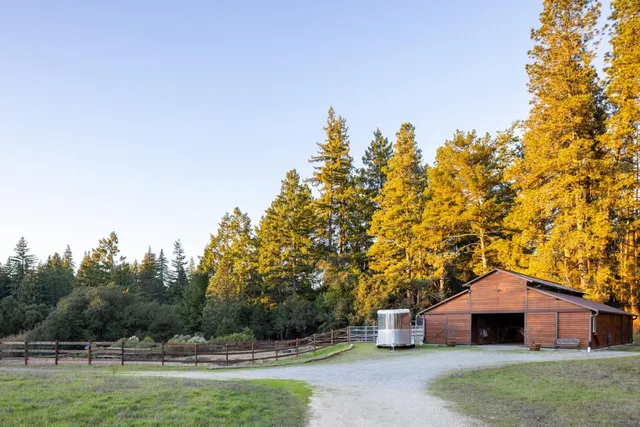 a view of a porch with wooden floor