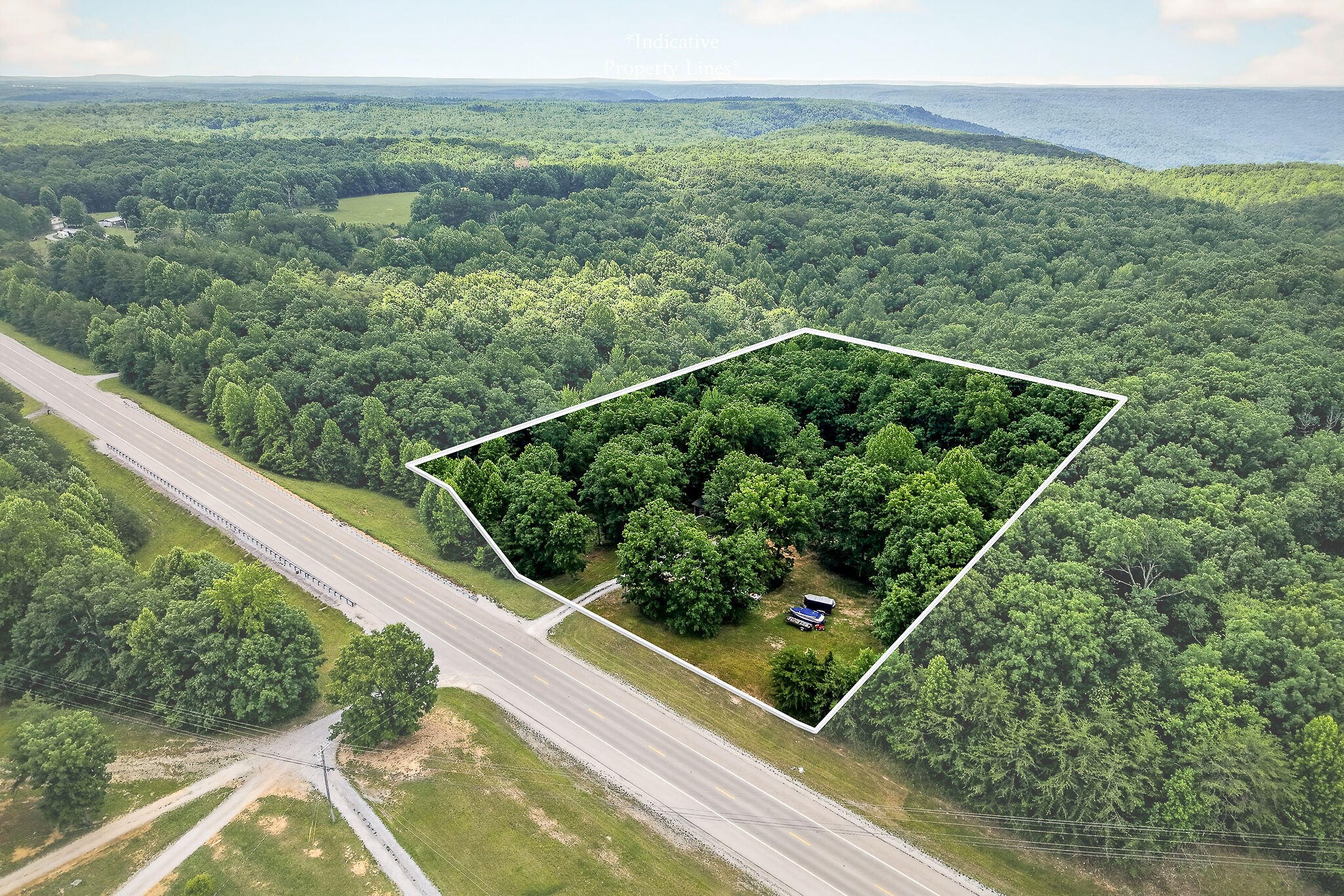 9388 Harrison Ferry Road McMinnville, TN 37110 - Photo 39 of 41 a view of a green field with sky view