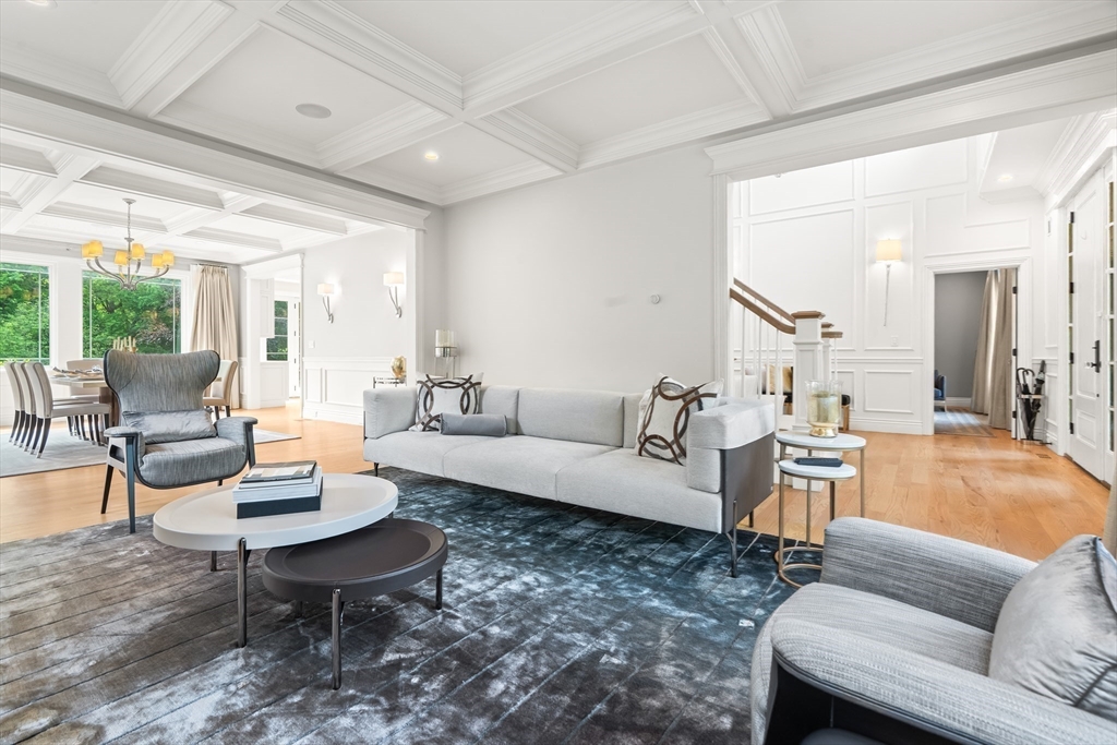 382 Lee Street Brookline, MA 02445 - Photo 16 of 38 a living room with furniture and a large window