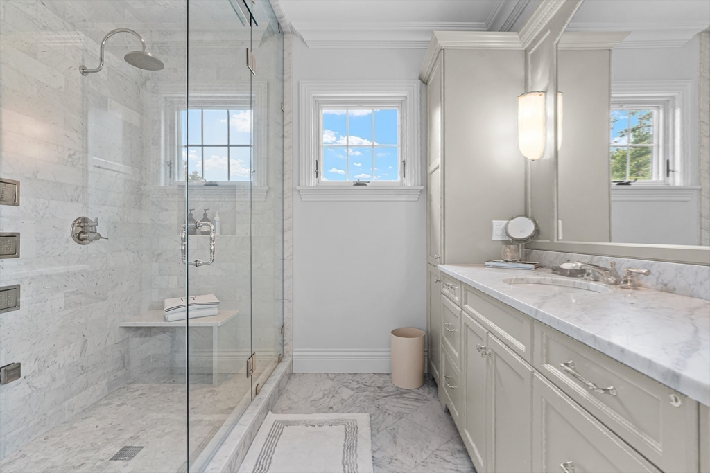 382 Lee Street Brookline, MA 02445 - Photo 27 of 38 a bathroom with a granite countertop sink mirror and double