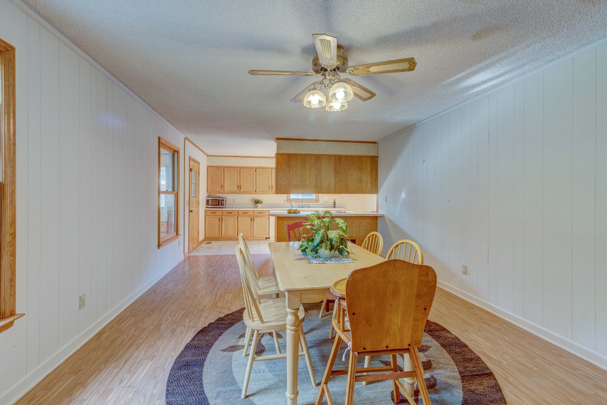 478 Brandon Road Manchester, TN 37355 - Photo 21 of 50 a view of a dining room with furniture and wooden floor