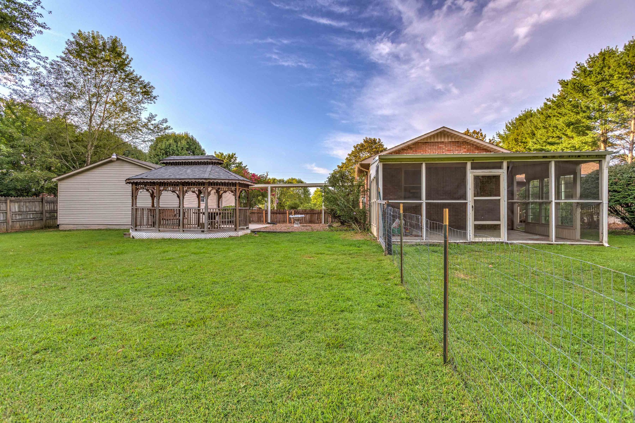 478 Brandon Road Manchester, TN 37355 - Photo 39 of 50 a view of a house with a yard and sitting area