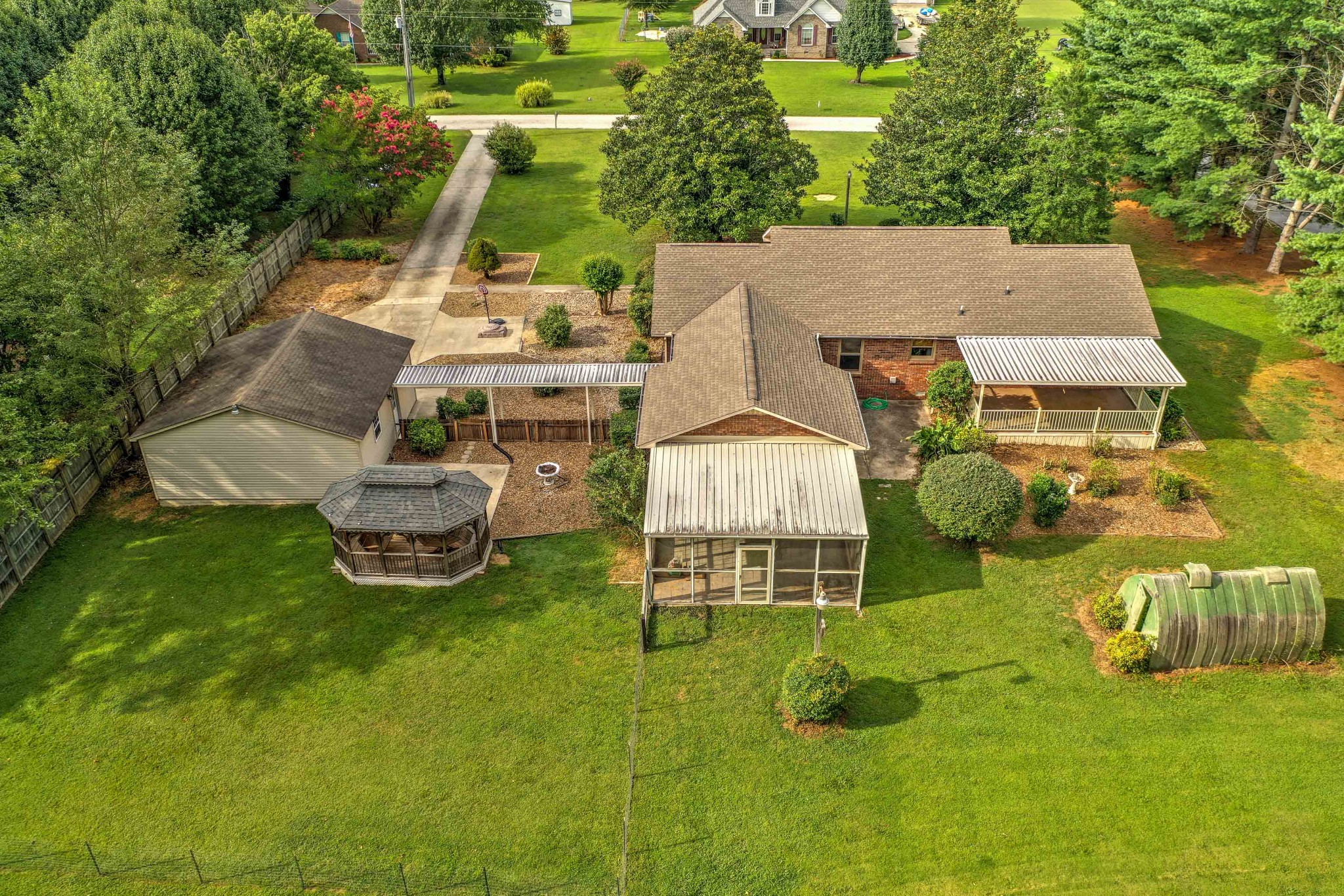 478 Brandon Road Manchester, TN 37355 - Photo 45 of 50 an aerial view of a house with swimming pool garden and patio