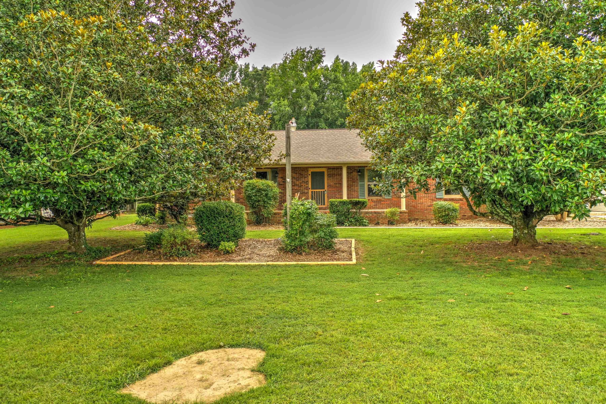 478 Brandon Road Manchester, TN 37355 - Photo 7 of 50 a front view of a house with a yard