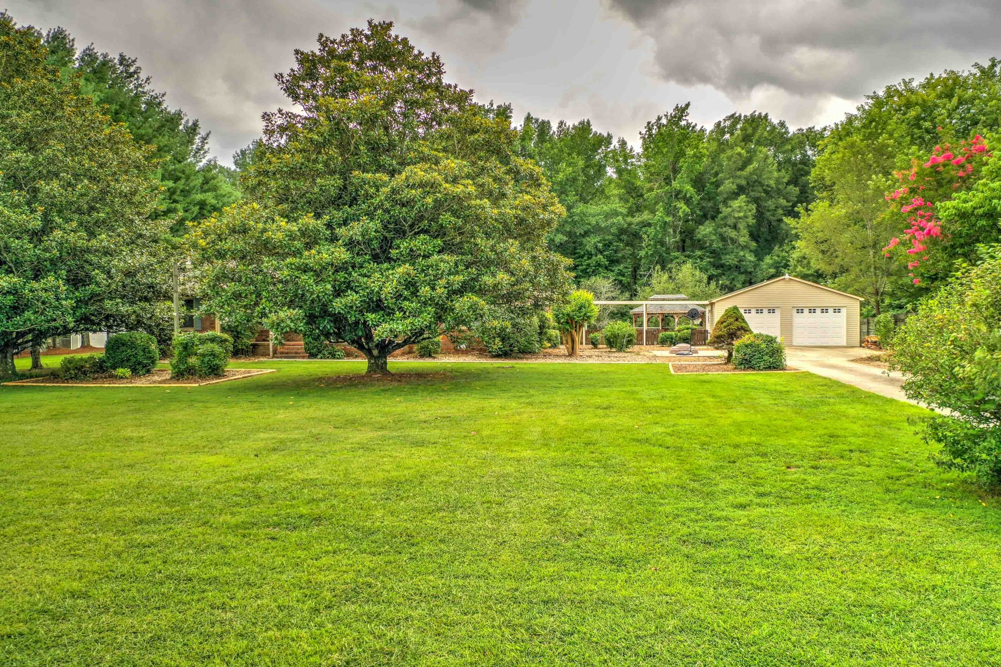 478 Brandon Road Manchester, TN 37355 - Photo 8 of 50 a front view of a house with garden