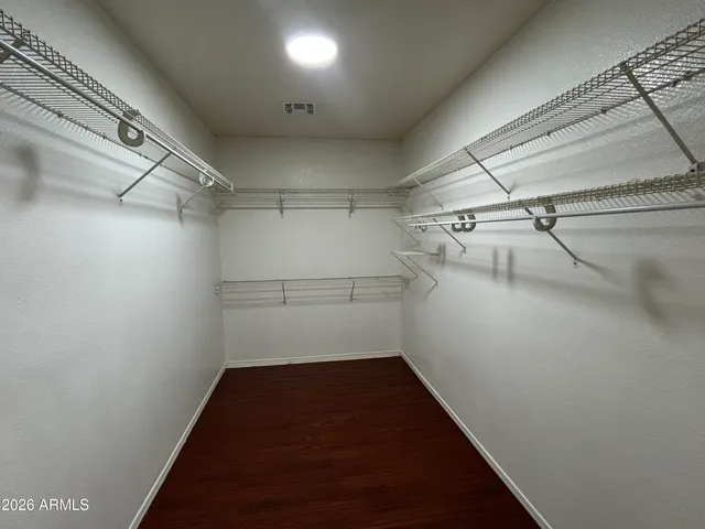 a view of a room with racks on the wall