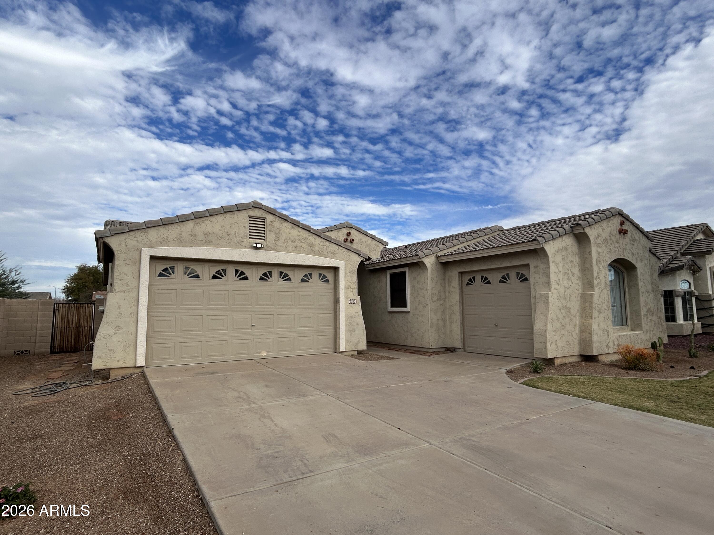 2202 West Carter Road Phoenix, AZ 85041 - Photo 2 of 20 a view of a garage