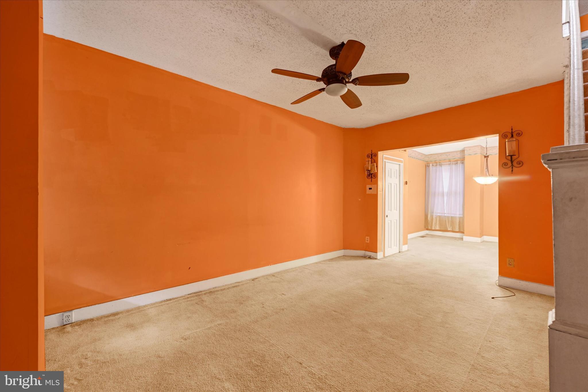 4024 Eierman Avenue Baltimore, MD 21206 - Photo 3 of 18 a view of a big room with a ceiling fan and a window