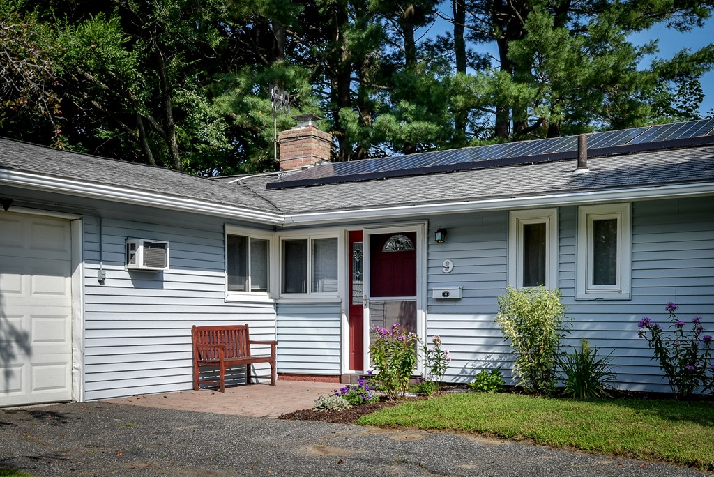 9 Ruth Drive Framingham, MA 01701 - Photo 2 of 25 a view of a house with a yard and large tree