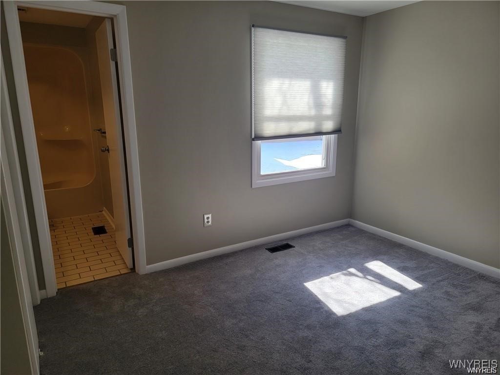 306 Sundown Trail, Unit 5C Amherst, NY 14221 - Photo 20 of 23 Second Bedroom with Ensuite